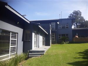 Elegant 7 bedroom home for sale in a prestigious, quiet neighborhood near the golf course.