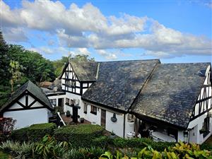 Magnificent Tudor-style Family Home in Secure Cowies Hill Estate!