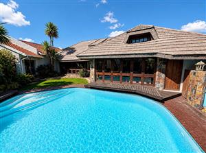 Elegant Family Living with Luxury Finishes, Solar Power & Stunning Entertainment Areas