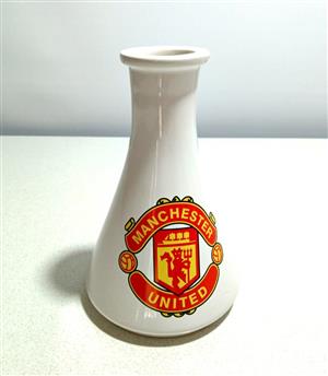Manchester United ceramic vase.