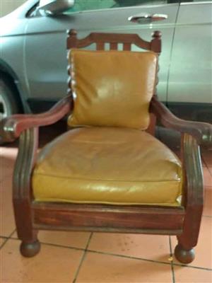 Arm chair with leather cushions