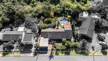 Ideal Family Home with Covered Patio, Pool, and Additional Flatlet