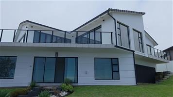 Exceptional Coastal Living with Sweeping Ocean Views – Dana Bay