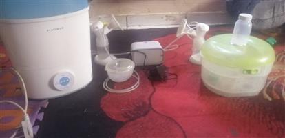 Electric breast pump.. Electric sterilizer and microwave sterilizer