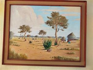 Framed antique painting of desert