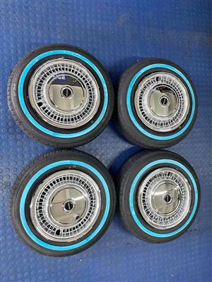 14 INCH A LINE STEEL BLACK RIMS+ TYRES  185/70/R14 WHITE WALL INCLUDING THE TOYOTA 87 CAPS