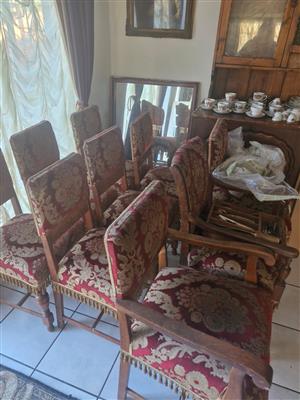 1920's Antique Jacobean Era dining chairs and brass and glass dining table 