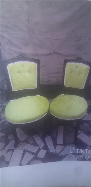 2 yellow velvet chairs