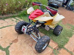 Sam and Dinly quad stripping for spares. Meyerton bike scrapyard new and secondhand spares. Andre