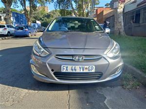 2017 HYUNDAI ACCENT SEDAN  1.6 FLUID PETROL, MANUAL, GREY, 77000kms
