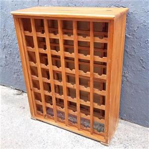 Pine wine rack. Price R450. 