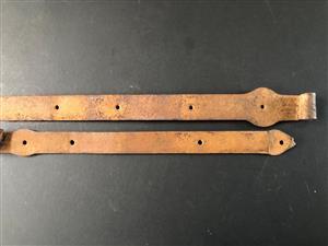 A vintage and antique set of strap hinges with scroll ends - price for the pair