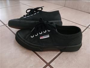 Used branded sneakers