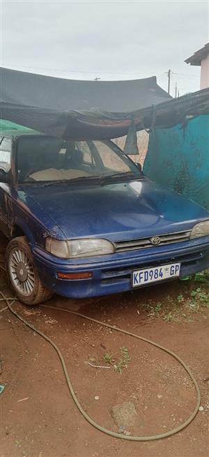 I'm selling my 1995 Toyota Corolla, 1.3 litres, with rims and leather seats