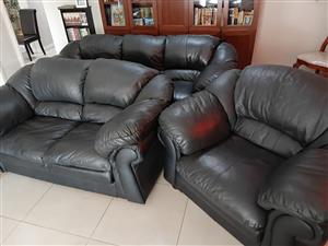 Black Leather lounge suite in good condition.