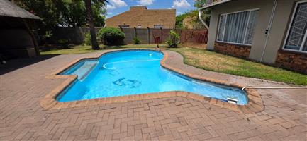 Spacious Family Home with Exceptional Entertainment Features on a Large Stand.