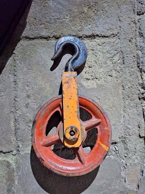 Hoist or tensioner pulley.
