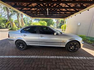  BMW E46. Drives extremely well with solid e