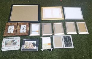 16 mostly new photo and some used photo frames for sale. 