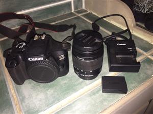 Canon EOS 4000d with 18-55mm lens starter pack with battery, battery charger, an