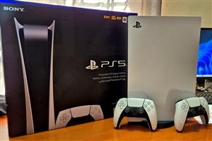 Sony PS5 Digital with controllers. 