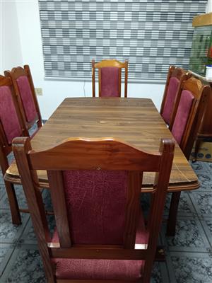 Dining room table and 6 chairs with extended table and a side unit for sale for.