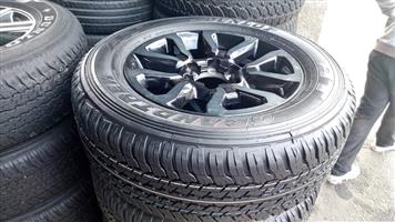 18 inch Toyota Legend 50 Rs mag with brand new 265/60/18 Dunlop  A/T to use for spare 