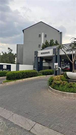 A modern 2 bed 2 bath apartment with a balcony in Halfway Gardens.