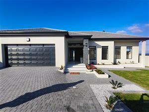 Luxury Coastal Executive Home with Sea Views & Premium Finishes
