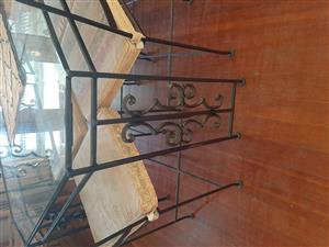 Custom design wrought iron table and chairs.