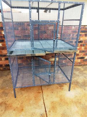  Avery functional double Parrot cage with trays. Call 