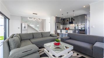 Modern 4 Bedroom Family Home with Exceptional Entertainment Spaces  in Sandown, Cape Town