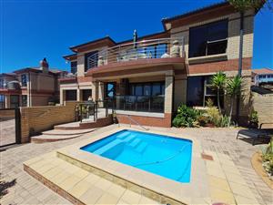 Modern Double-Storey Luxury with Iconic Views in Midoné, Wavecrest