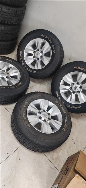 17inch Toyota Hilux GD6 original mags with 265/65/17 Royal Black AT tyres set 