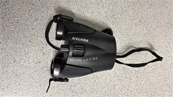 Pentax Compact Professional Binoculars 10x25 UCH X ii with carry case and strap. Excellent condition
