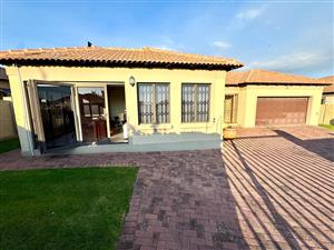 Elegant Tuscan-Style Home with Spacious Living & Indoor Entertainment Area