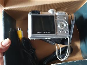 Digital camera with cables and charger