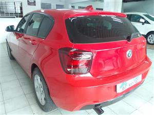 2014 BMW F20 118i sportline Automatic, Petrol Red color  