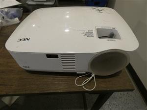 NEC projector in good working condition but no air filters, lamp life 60%.