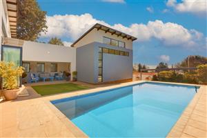 Experience Luxurious Multi-Generational Living in Forest Town!