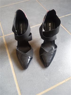 High stilettos, size 5, tried on but never used, was a gift, too high for me.