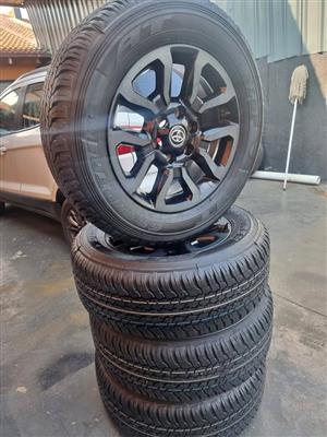 18" Toyota Legend RS original mags with brand new 265/60/18 Dunlop Grandtrek AT25 set 