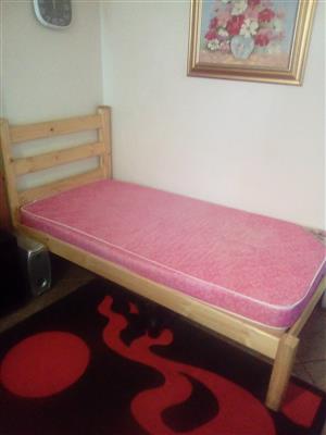 Single wood bed good condition with mattress...
