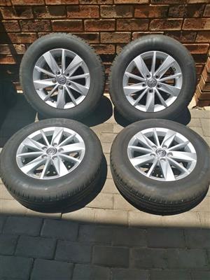 15 inch VW Caddy, Jetta, Golf 5&6 mags with used 195/65/15 tyres set  (5x112pcd).