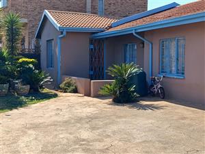 A spacious and beautiful family home in the highly sought-after neighbourhood of Lenasia south