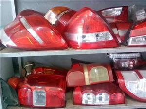 Tail lights and two grills for sale one GD 6 and one BMW