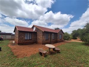 1494m2 of potential development with  3 bedroom Family Home. Well kept and Immaculate.