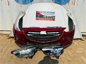 Mazda CX-3 front spares (bonnet,bumper,left and right fenders,left headlight)