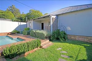 Comfortable Family Home with Modern Features and Bonus Cottage!