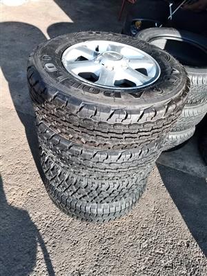16" Isuzu mas with x2 new tyres x2 (90%) all terrain tyres set